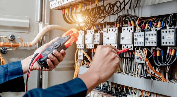 Certified electrician in Dubai working on an electrical panel