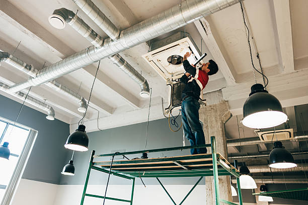 Adnanfixit electrician installing LED downlights in Dubai